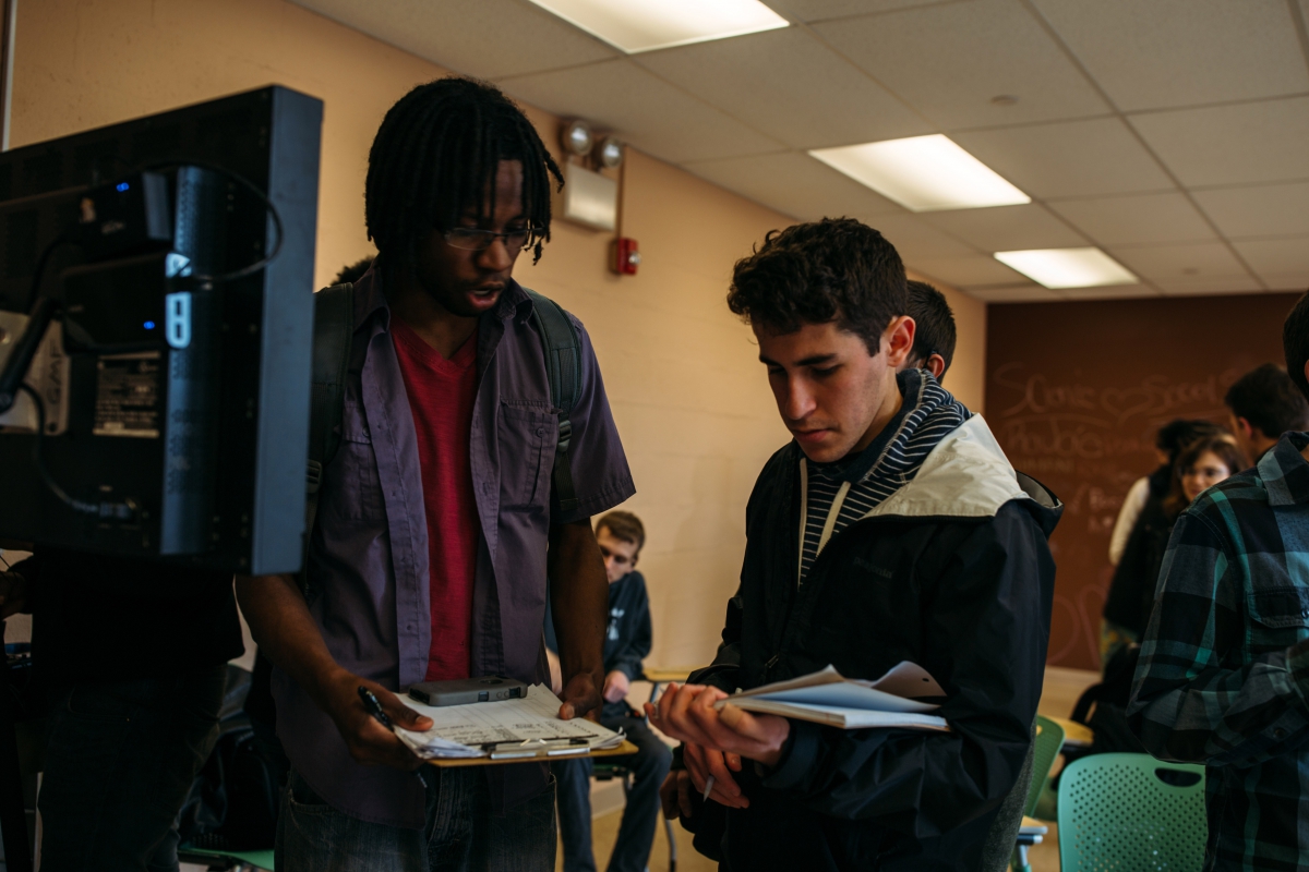 Ian McIntosh, script supervisor for “The Rehabilitation of the Hill,” reviews a scene’s shots with Pitt senior Joaquin Gonzalez. Gonzalez studies mechanical engineering in the Swanson School of Engineering.