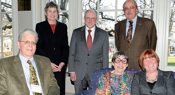 Patricia E. Beeson, Pitt provost and senior vice chancellor, and Alberta Sbragia, vice provost for graduate studies, gather with the four winners of the 2014 Provost’s Award for Mentoring. Sitting, from left, are Allan R. Sampson, Marcia Landy, and Provost Beeson. Standing, from left, are Vice Provost Sbragia, Stephen B. Manuck, and Trevor J. Orchard.