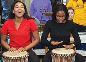The day was not all work—after a morning of cleaning at Sankofa Village of Arts in Wilkinsburg, participants received the unexpected gift of lessons in African drumming and martial arts.
