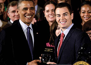 Sean McComb (center) at a White House ceremony honoring him for his Teacher of the Year Award. 