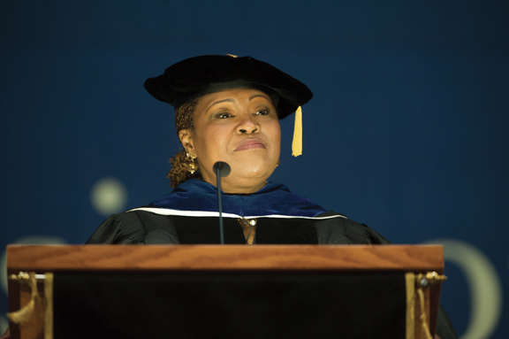 Pitt Dean of Students Kathy Humphrey address students during Aug. 22 Freshman Convocation in the Petersen Events Center. 