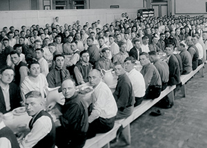 Enlisted men eat dinner at Soldiers and Sailors Memorial Hall. Within months, a mess hall and seven large barracks were built on campus.