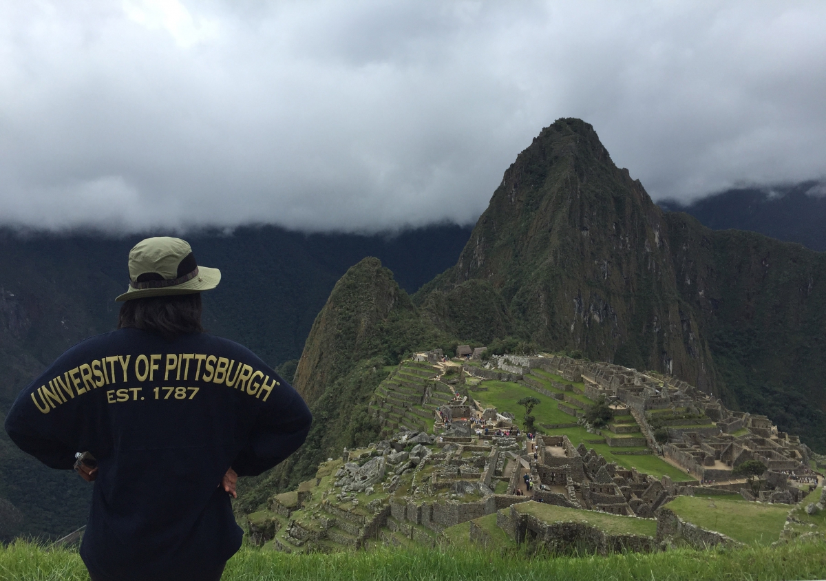 student overlooking a vista in Peru