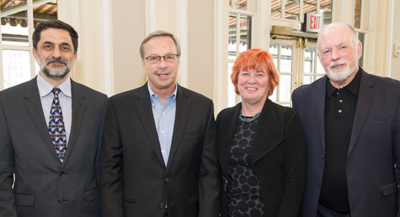 Recipients of the 2017 Provost’s Award for Excellence in Mentoring who attended the ceremony posed with Pitt Provost Patricia E. Beeson. From left: Peter Brusilovsky, John Prescott, Beeson and William Dunn.
