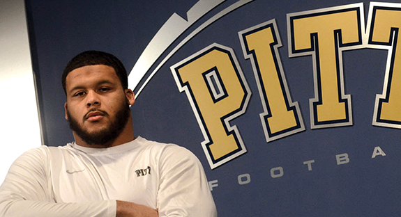 ALL-AMERICAN AARON DONALD Aaron Donald, Pitt’s All-American senior defensive tackle, became the most decorated defensive player in college football during the 2013 season. His crowning achievement—being voted a unanimous All-American—makes him Pitt’s first defensive player to earn unanimous status since legendary defensive end Hugh Green in 1980. Donald also scooped up four other esteemed national awards in December: the Bronko Nagurski Trophy, the Chuck Bednarik Award, the Outland Trophy, and the Rotary Lombardi Award. The 6-foot, 285-pound Donald leads the nation in tackles for loss, while ranking 13th in forced fumbles, and 12th in sacks. “It is tremendous as a coach when your best player is also your best worker,” Pitt head football coach Paul Chryst said. “Aaron truly enjoys the film study and preparation part of the game. He plays every day in practice like it’s a game day. Aaron has earned all of the accolades he has received, and we are all incredibly proud of him.”