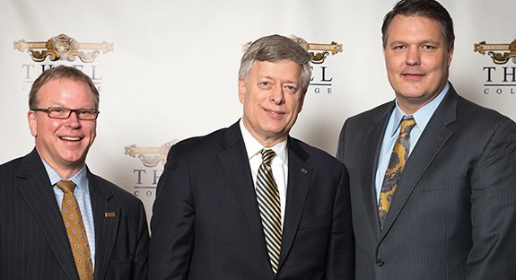 Thiel Board of Trustees Chair Mark Benninghoff, Chancellor Mark A. Nordenberg, and Thiel College President Troy D. VanAken.