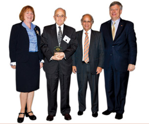 The University of Pittsburgh’s 7th Annual Celebration of Innovation, held on Oct. 12 at the University Club, honored 53 Pitt researchers with Innovator Awards, including Marlin Mickle (second from left), the Nickolas A. DeCecco Professor in the Department of Electrical and Computer Engineering. Earlier this year, Mickle and his research team created Ortho-Tag, Inc., a company that makes tags imbued with radio-frequency identification (RFID) technology that, once attached to prosthetic joints, allows doctors to track and monitor the artificial joints with a wave of a wand. From left, Pitt Provost and Senior Vice Chancellor Patricia E. Beeson; Mickle; Arthur S. Levine, dean of Pitt’s School of Medicine and senior vice chancellor for the health sciences; and Pitt Chancellor Mark A. Nordenberg.
