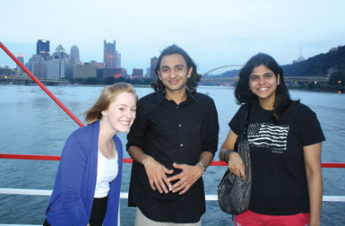  4. Riding the Gateway Clipper were (from left) Elaine Lewis, a Pitt senior majoring in history and political science; and Waqas Khatri of Karachi, Pakistan, and Krithika Sundar of Tamil Nadu, India, both of whom are Penn State graduate students. 