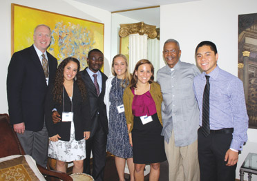 Pitt Vice Chancellor for Public Affairs Robert Hill, second from the right in the photograph above, hosted a Dinner Dialogs evening with several Hesselbein Global Academy participants at his Mount Washington home. The others seen in the photograph are, from left, Larry Olson, a program mentor and vice president/director of marketing for John Wiley & Sons, Inc.; and students Cecilia Vargas, University of Monterrey, Mexico; Kingsley Essegbey, Central University, Accra, Ghana; Amarette Edmonson, St. Edward’s University, Austin, Texas; Laura Glaub, Saint Mary’s College, Notre Dame, Ind.; and Gentry Tran, Beloit College, Beloit, Wis.  