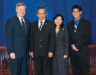 From left, Chancellor Mark A. Nordenberg; Wen-Ta Chiu; his wife, Juan; and their son, Jason, in a photo taken during the 2009 Legacy Laureate dinner at Pitt.