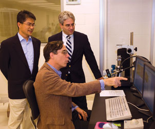 Pitt’s David Waldeck (seated) works with Hong Koo Kim (standing left), and David Geller, the Richard L. Simmons Professor of Surgery in Pitt’s School of Medicine and codirector of the UPMC Liver Cancer Center. Waldeck’s research is focused on finding a way to use nanoparticles to make a commercially viable photovoltaic paint that can convert sunlight into electricity. Waldeck is a professor of chemistry and chair of the Department of Chemistry in the School of Arts and Sciences.