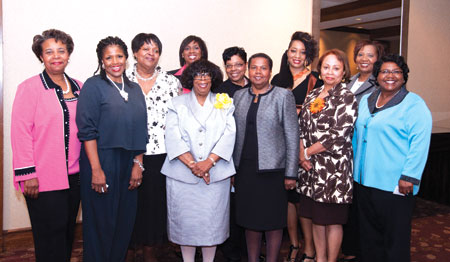   Fifty African American women from Southwestern Pennsylvania have been named Women of Excellence by the New Pittsburgh Courier. The women, selected for making significant contributions to the local community and business world, were honored during a July 14 luncheon at the Westin Convention Center Hotel. Several of the honorees were Pitt alumni, including the following. Front row, from left: Joy Starzl, (SOC WK Certificate of Advanced Studies ‘97, '97G), Margaret Smith Washington (SOC WK ’70G, GSPH ’74), Deborah Holland  (A&S ’74, EDUC ‘80G), Marlene Gary Hogan (A&S ’73), and Kathy Mayle Towns (NURS ’77, ‘80G, KGSB ’82). Back row, from left: Joanne Cobb Burley (EDUC ‘79G), Jeanette Blackston (SIS ‘76G, EDUC ’96G, ), Amelia Michele Joiner (CGS ’98), Emma Lucas-Darby (SOC WK ‘77G, ‘86G), Sheila Beasley (CGS ’87), and Patricia Wade-Johnson (CGS ’87).