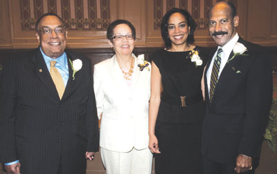 Sharon Epperson (third from left), a CNBC-TV correspondent, was the keynote speaker for the May 2 School of Social Work Afternoon of Recognition at Soldiers & Sailors Memorial Hall and Museum. She stands with (from left) her father, David E. Epperson (A&S ’61, ’70, ’75G, SOC WK ’64), who was dean of the School of Social Work from 1972 to 2001; her mother, Cecilia Trower Epperson (EDU ’57, ’61G); and Larry E. Davis, Pitt’s Donald M. Henderson Professor, current dean of the School of Social Work, and director of the Center on Race and Social Problems.