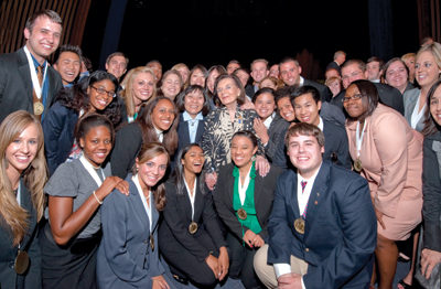 Frances Hesselbein, second row, center, surrounded by a group of international students leaders.