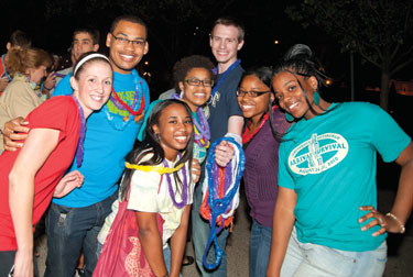 Tropical leis and hula dancing drew students to a nighttime luau outside the William Pitt Union on Aug. 26.