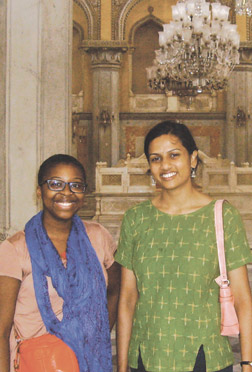 Zoe Samudzi (left), a Pitt sophomore majoring in political science, stands in Chowmahalla Palace in Hyderabad, India, which was the seat of a Persian dynasty that once ruled in Andhra Pradesh. Samudzi was in India doing  research on how Indian people in the Andhra Pradesh region age. She is standing with Niranjani Thuppal, a second-year Pitt medical student.