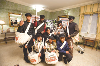 Newsboys (and girls) added to the evening’s ambience by delivering free Courier newspaper facsimile programs. Front row, from left: Anwara Tayloradams, Lana Macklin, and Keanu Davis. Back row, from left: Naeem Davis, David Humphrey, Amani Davis, Alexis Dixon, and Daniel Humphrey.