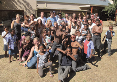 The 2011 PittMAP students visited James House, a nongovernmental organization in Hout Bay, South Africa, just south of Cape Town. James House is both a home for children whose parents can no longer take care of them and a center providing after-school and summer programs for children who live in Imizamo Yethu, a shantytown (or informal settlement). The PittMAP group, whose focus of study was global health issues, met with James House staff, and this photo was taken as the Pitt group was leaving.