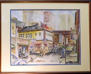 Williams' courthouse office is filled with personal keepsakes, including artwork that the judge said keeps him mindful of his family roots in Manchester. Above, a painting of Market Square during the 1950s.