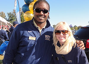 University staff members and alumni Ron Idoko and Molly Knorr enjoy pregame festivities at the Pitt vs. Navy showdown in Annapolis, Md., on Oct. 26.