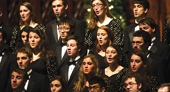 Chancellor Mark A. Nordenberg hosted the annual Music for the Holiday Season event on Dec. 4, which traditionally features a special performance by the University’s renowned Heinz Chapel Choir, directed by John Goldsmith (pictured below with Chancellor Nordenberg). Guests began their evening in Heinz Chapel, where the choir filled the beautiful space with seasonal songs from Renaissance motets to spirituals to popular holiday tunes. The program was taped in live performance and aired on Pittsburgh’s WQED FM radio on Christmas morning. After the concert, guests enjoyed a reception in the Cathedral of Learning’s Commons Room, decked for the holidays and full of good tidings.