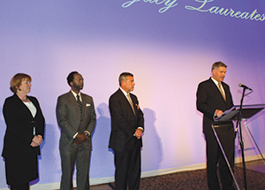 From left, Pitt Provost and Senior Vice Chancellor Patricia E. Beeson, School of Law Dean William M. Carter Jr., Legacy Laureate Greg Jordan, and Chancellor Gallagher