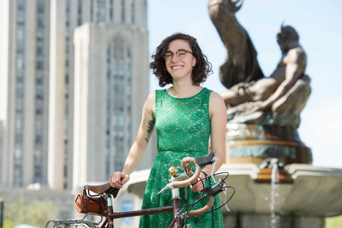 Naomi Anderson holds a bike