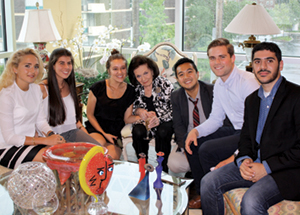 Enjoying a July 24 dinner hosted by Eva Tansky Blum, Pitt Board of Trustees chair, were Hesselbein delegates, from left, Klaudia Lewonczyk of Sejny, Poland (Northeastern Illinois University); Daniela Corzo Ruiz of Cúcuta, Colombia (Universidad de Los Andes Bogotá, Colombia); Anna Mammedova of Ashgabat, Turkmenistan (Delta State University, Cleveland); Frances Hesselbein; Franz Wayne Rivera of Manila, Philippines (Carnegie Mellon University); Daniel Lampmann of Schwenksville, Pa. (Pitt); and Abdullah Aljamal of Riyadh, Saudi Arabia (Prince Sultan University).