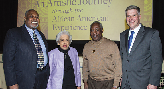 Members and friends of the Pitt community shared an evening of poetry, music, and reflection as they celebrated the University’s 2015 K. Leroy Irvis Black History Month Program on Feb. 19 at the Twentieth Century Club in Oakland. Chancellor Patrick Gallagher (right) hosted “An Artistic Journey through the African American Experience.” Three distinguished individuals were recognized for contributions to their fields: from left, Sala Udin, a politician and activist who for 11 years represented the Hill District on Pittsburgh City Council; Doris Brevard (EDUC ’52), a librarian and teacher at the former Robert L. Vann School in the Hill District, who served as the school’s principal from 1969-1995; and Roger Humphries, a professional jazz drummer who has accompanied many jazz greats. 