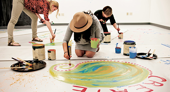 Painters, dancers, and musicians gathered March 14 for the grand opening of the “Center for Creativity: The Workshop.” Located downstairs in the University Store on Fifth, the center is a pilot space primarily for creating connections among members of the University community, while also making drawings, music, scenes, apps, and definitely messes. Jeanne Marie Laskas, director of Pitt’s Writing Program, and a steering committee breathed life into the center, which is open to anyone with a Pitt ID. Materials provided. Amateurs welcome. (Photo by Emily O'Donnell)