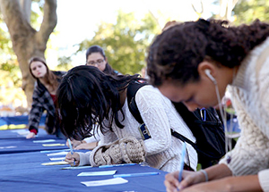 Students write their definitions of diversity.