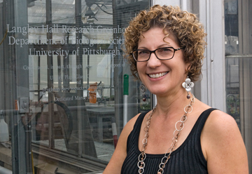 Tia-Lynn Ashman at the Langley Hall Research Greenhouse