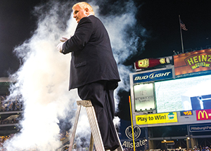 University of Pittsburgh Band Director Brad Townsend strikes up the band at halftime during the Sept. 2 Pitt-Florida State University matchup held at Heinz Field. The game marked Pitt’s debut as a member of the Atlantic Coast Conference, which is generally regarded as one of the top athletic and academic conferences in the country. The evening also marked Townsend’s debut at the North Side stadium—hired in January, Townsend succeeds the legendary Jack R. Anderson, who directed Pitt’s band from 1995 until 2012.