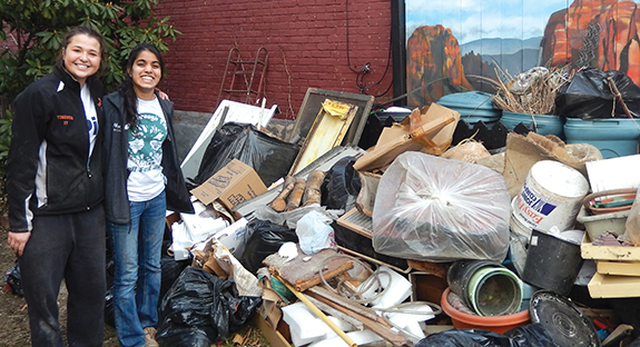 Students helped a Ward Street homeowner in South Oakland clean out her house. The day was sponsored by Pitt’s Office of Community and Governmental Relations.