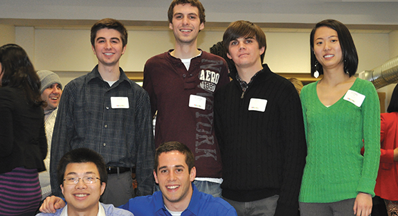 MeshNet members celebrate their $25,000 investment from Thrill Mill at the start-up incubator’s East Liberty offices. In top row, from left, Adam Coimbra, Nicholas Amoscato, Alex LaFroscia, and Lutong Yang. Bottom row, from left, Bill Wang and Mark Visco. Team members not pictured are Jie Chen, Xue Huichao, and Dom Visco.