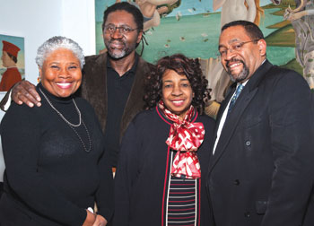 Pitt’s African Heritage Classroom Committee (AHCC) members, Pitt students, and members of the public gathered Feb. 20 in the Frick Fine Arts Building’s auditorium to view The Forgotten Root, ( Rafel Rebollar Corona, 2001), a film about the forgotten African presence in Mexico. Visitors also toured the African Heritage Classroom, one of Pitt’s 27 Nationality Rooms housed in the Cathedral of Learning. Pictured here in the Frick Fine Art’s atrium are Donna Alexander, AHCC membership chair; Jerome Branch, a Pitt professor of Latin American and Cultural Studies, who moderated a discussion after the movie; Maureen Cross Bolden, AHCC chair; and Harold Hayes (A&S ’75), master of ceremonies and a KDKA television news reporter. 