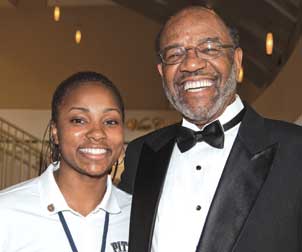Ashlee Anderson, Pitt sophomore and women’s basketball team member, and Julius Pegues (ENGR ’59), Pitt’s first African American men’s basketball player.