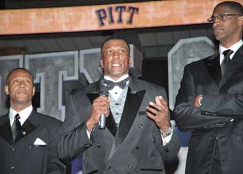 From left, Curtis Aiken (CGS ’87), Pitt basketball star from 1983 to ’87 and Pitt men’s basketball broadcaster; Roger Kingdom (CGS ’02), Pitt football and track star, winner of two Olympic gold medals (1984 and 1988) in the 100 meter hurdles; and Charles Smith (A&S ’88), Pitt men’s basketball career-scoring leader and retired NBA player.