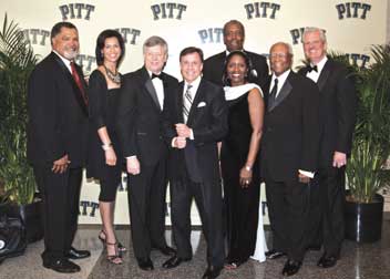 From left, event cochair David Garnett (A&S ‘71), a Pitt football player from 1968 to ’70; CNN news anchor Fredrica Whitfield; Pitt Chancellor Mark A. Nordenberg; NBC sportscaster and event emcee Bob Costas; Brian Salter (A&S ’71), event cochair, Pitt trustee, a Collegiate All-American in Track and Field, a Pitt football player from 1968 to ’70, and an NFL player from 1971 to ’76; Linda Wharton Boyd (A&S ’72, ’75G, ’79G), president of Pitt’s African American Alumni Council; Pitt trustee Herbert P. Douglas Jr. (EDUC ’48, ’50G), a bronze medalist in the long jump at the 1948 Olympics and one of the first three African Americans to play football for Pitt, in 1945; and Steve Pederson, Pitt athletics director.