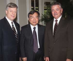   A delegation of six officials from China’s Wuhan University, including its president, Hailiang Gu, visited Pitt Oct. 13-14. Gu met with Pitt Chancellor Mark A. Nordenberg, and the two executives signed an agreement to create a five-year program in library and information sciences that will allow students from each university to study at the other—and to earn a bachelor’s degree from their home university and a master’s degree from the other university. Members of the Chinese delegation met with several Pitt officials, including those from the School of Information Sciences, the School of Education, the School of Medicine, the Asian Studies Center, the Confucius Institute, and the University Center for International Studies. Pictured (from left) are Nordenberg, Gu, and Stephen R. Tritch, chair of Pitt’s Board of Trustees.    