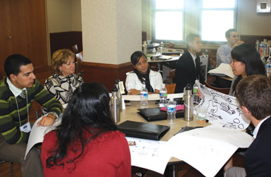 Pitt trustee Eva Tansky Blum (seated at left with black-and-white jacket) served as a professional mentor for summit participants. Cochair of Pitt’s $2 billion capital campaign and a past president of the Pitt Alumni Association, Blum (A&S ’70, LAW ’73) is senior vice president and director of community affairs at PNC Bank and chair of the PNC Foundation. 