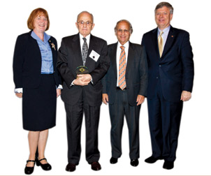 Innovation-Awards-2011-024981_539_DIG_DSC_9340_01 The University of Pittsburgh’s 7th Annual Celebration of Innovation, held on Oct. 12 at the University Club, honored 53 Pitt researchers with Innovator Awards, including Marlin Mickle (second from left), the Nickolas A. DeCecco Professor in the Department of Electrical and Computer Engineering. Earlier this year, Mickle and his research team created Ortho-Tag, Inc., a company that makes tags imbued with radio-frequency identification (RFID) technology that, once attached to prosthetic joints, allows doctors to track and monitor the artificial joints with a wave of a wand. From left, Pitt Provost and Senior Vice Chancellor Patricia E. Beeson; Mickle; Arthur S. Levine, dean of Pitt’s School of Medicine and senior vice chancellor for the health sciences; and Pitt Chancellor Mark A. Nordenberg.