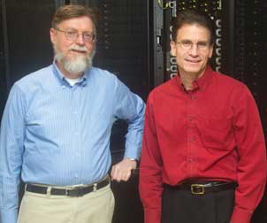 Pitt’s Center for Simulation and Modeling (SAM) is codirected by Kenneth D. Jordan (left), Distinguished Professor of Computational Chemistry, and J. Karl Johnson, W.K. Whiteford Professor and Interim Chair in the Department of Chemical and Petroleum Engineering. The center, a multidisciplinary research organization established in Fall 2008, helps Pitt researchers tackle large-scale questions through the use of enormously fast and complex computers. Jordan and Johnson are standing in Eberly Hall, where a number of the center’s computer banks are located.