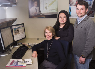 Louise Comfort (seated), a professor in Pitt’s Graduate School of Public and International Affairs (GSPIA), travels the globe in her quest for understanding how governments and residents handle natural disasters. “I’m very interested in the decision making” that’s done at the time of disasters, says Comfort, an organizational design theorist and policy analyst. She has developed a computer-based decision support tool that can be used by emergency managers in a rapidly changing, urgent environment. Above, Comfort talks with Pitt’s Center for Disaster Management staffers Aya Okada, a GSPIA doctoral candidate who traveled with Comfort to Japan following the 2011 tsunami there, and Clayton Wukich, a postdoctoral fellow.