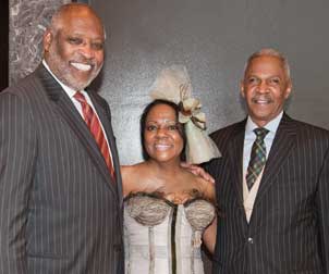 Three Rivers Youth (TRY) honored Robert Hill (right), Pitt vice chancellor for public affairs, and George Miles Jr. (left), a Pitt trustee, executive chair of Chester Engineers, and former president and CEO and now a trustee emeritus of WQED, during the TRY’s Sixth Annual Nellie Leadership Awards held May 6 in the USX Tower Upper Lobby. Nellie honorees are selected for their leadership, personal achievements, and positive impact on the quality of life for the region’s youth and families. Hill received his award in the education and civic engagement category, while Miles was honored in the public broadcast and education category. Invited guests were to wear 1940s-era attire in keeping with the event’s “An Evening at the Cotton Club” theme. Pitt alumnus Peggy Harris (center) is president and CEO of TRY, which assists at-risk youth and families, and a member of the Board of Visitors of Graduate School of Public and International Affairs, from which she earned the MPA degree in 1978. Nellie was the name of the first resident of a 19th-century local orphanage for Black children that is today Three Rivers Youth.