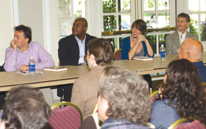 Pitt’s Department of History hosted a Sept. 15 symposium on Professor Rob Ruck’s recent book, Raceball: How the Major Leagues Colonized the Black and Latin Game (Beacon Press, 2011). Addressing a standing-room-only audience in the William Pitt Union’s Lower Lounge were (from left) Laurent Dubois, the Marcello Lotti Professor of Romance Studies and History at Duke University and author of Soccer Empire: The World Cup and the Future of France; Sean Gibson, the great-grandson of Baseball Hall of Fame legend Josh Gibson and executive director of the Josh Gibson Foundation, a Pittsburgh nonprofit organization; Lara Putnam, a Pitt history professor; and Ruck.