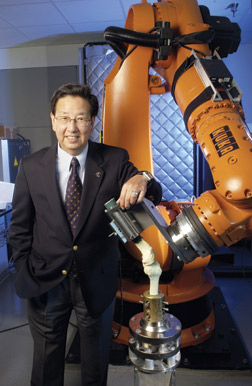 Savio Woo with a robotic/Universal-Force Sensor  testing system