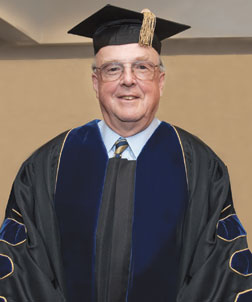 Swanson-in-cap-&-gown John A. Swanson