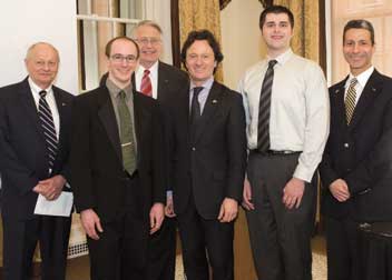 Deputy Consul General Oliver Schnakenberg of the Consulate General of Germany in New York visited the University March 14 to present awards to Pitt’s two winning teams in the German Embassy’s green ideas competition. From left, George Klinzing, Pitt vice provost for research; Chris Rovensky, Pitt chemical and petroleum engineering student; David Murdoch, the honorary German Consul in Pittsburgh; Schnakenberg; Adam Sparacino, Pitt electrical and computer engineering student; and Gregory Reed, a Pitt professor of electrical and computer engineering and director of Pitt’s Power and Energy Initiative.