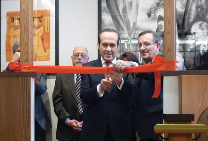 3. Namık Tan, the Turkish ambassador to the United States, cuts the room’s ribbon. To his left stands Turkish Room Chair Malik Tunador.